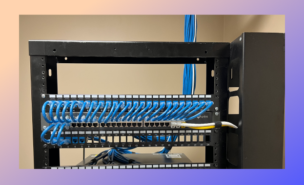 Network cables tied neatly on a server rack.